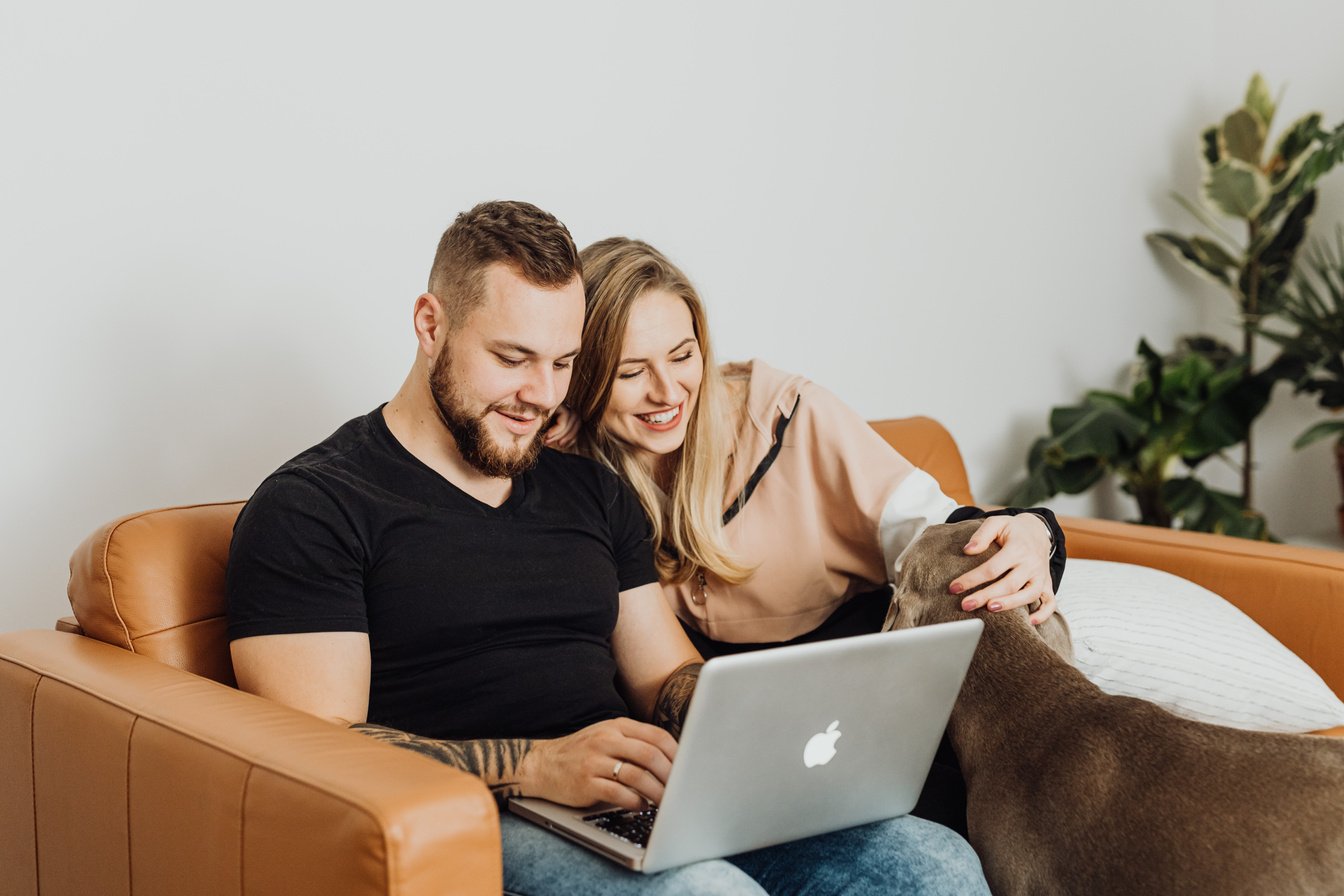 Couple Sitting Together on Sofa